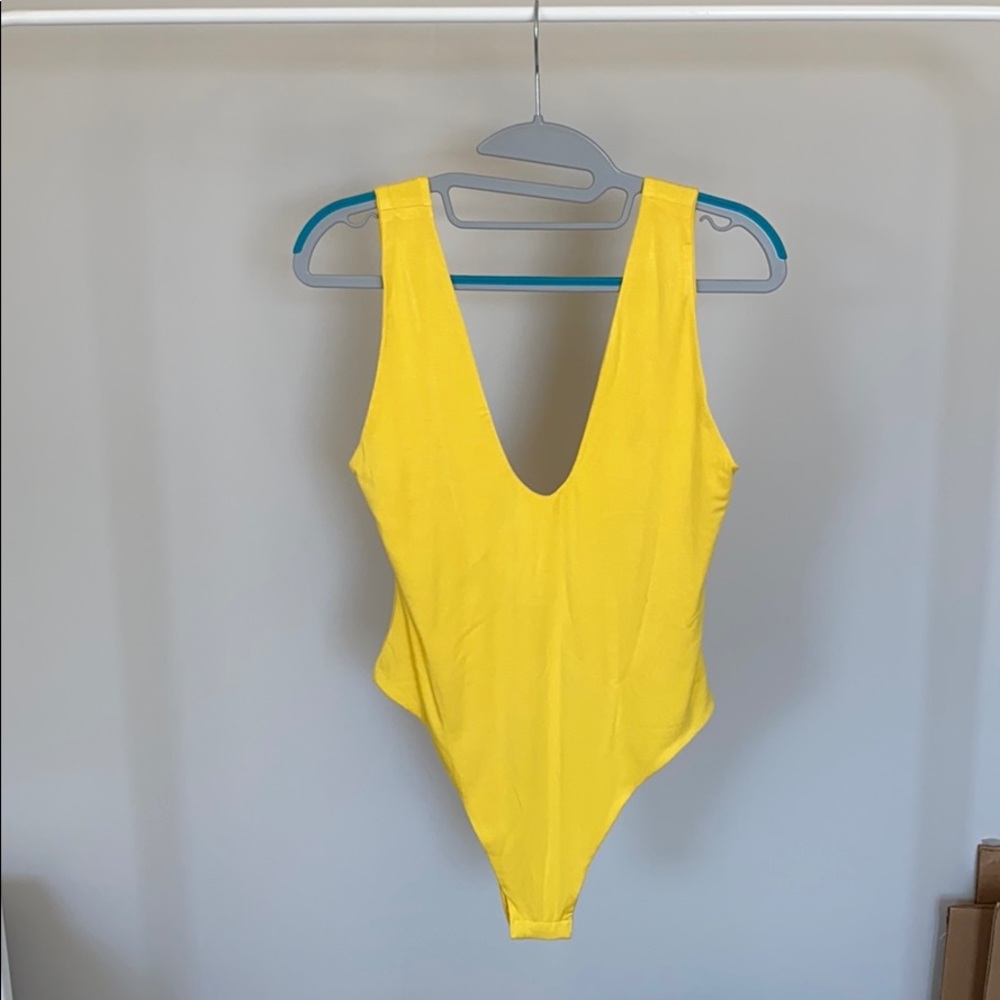 By the way. Joy high cut bodysuit yellow. Medium